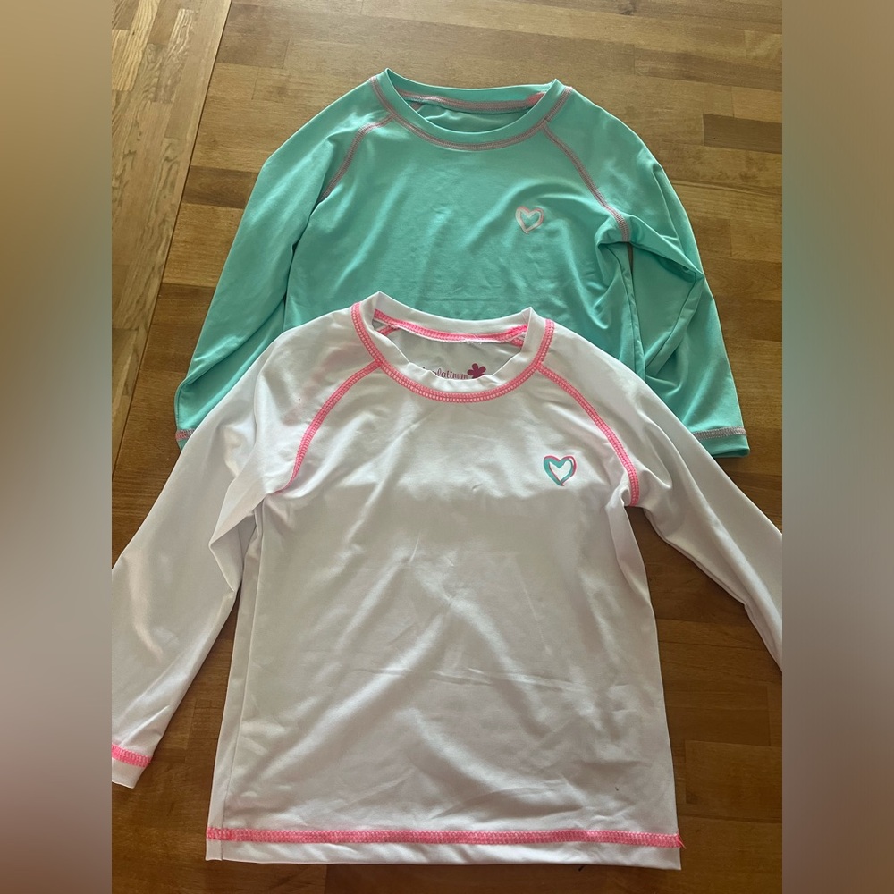 2 girls pink platinum long sleeve swim
Shirts size 5/6